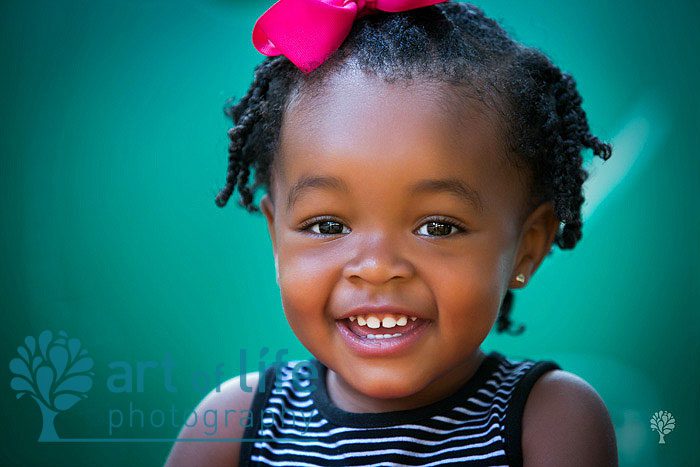 baby smiling on a slide Atlanta Children's Photography